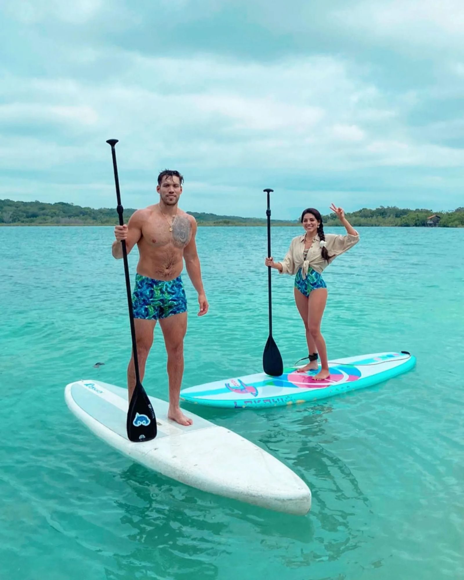 Paddleboarding off the dock