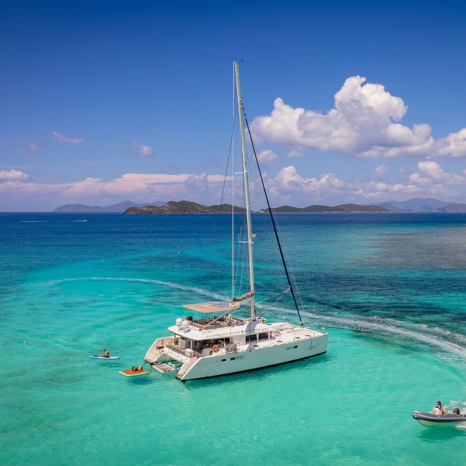 A catamaran over the reef